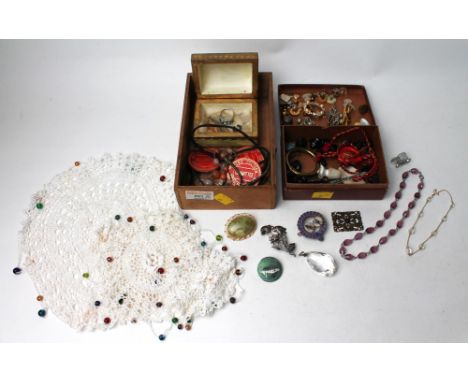 Two boxes of vintage costume jewellery including Holme Cultram Agricultural Society badges, buttons, brooches, jet beads, cro