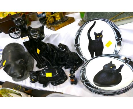 Composite cat garden ornament, Winstanley style black cat and a quantity of cat ornaments and plates 