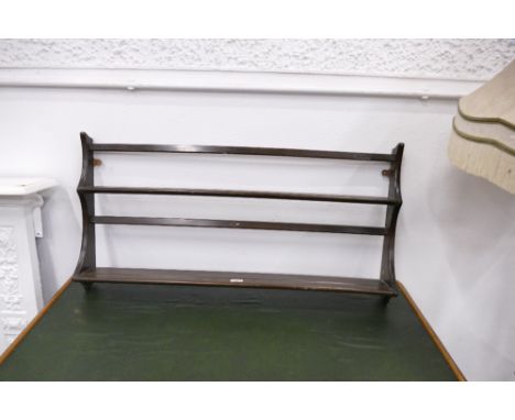 Dark Ercol wall hanging plate rack 