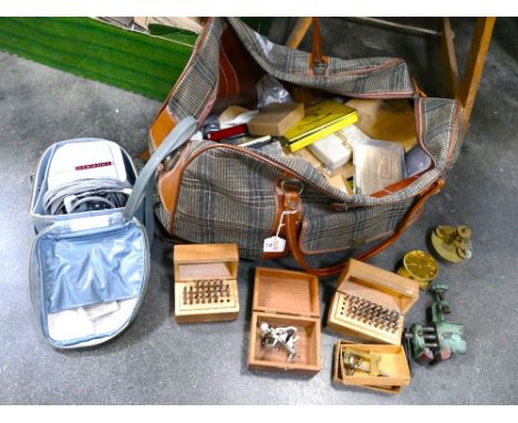 Bag containing precision tools, miniature vice clamps and watch preparing equipment 