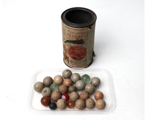 Vintage tin containing marbles 