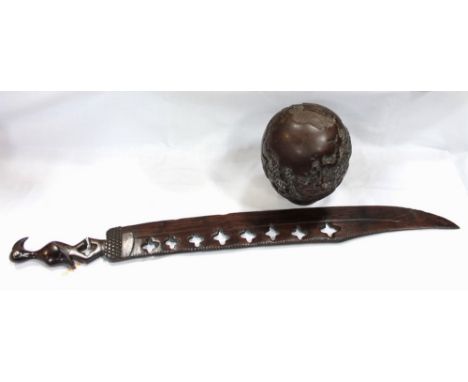 Hardwood carved lidded trinket pot, decorated with map of the world and an ornamental wooden knife