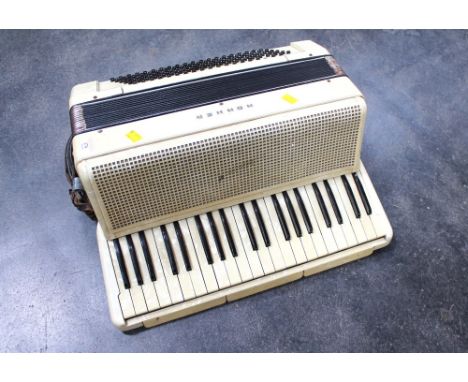 Hohner mother of pearl style accordian Model 38207