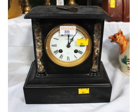 Slate mantel clock by Wheatley of Paris, 23 cm high 