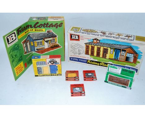 A collection of various boxed Britains farm building series and farm accessories to include No. 4716 farm cottage, No. 4719 r