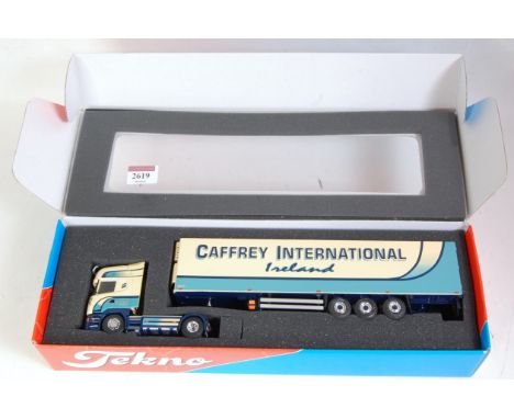 A Tekno 1/50 scale model of a Caffrey International of Ireland Scania Topline tractor unit with refrigerated trailer, appears