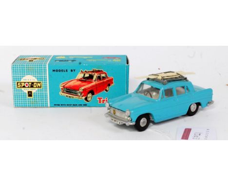A Spot-On Models No. 184 Austin A60 Cambridge comprising light blue body with spun hubs and white interior, with two cream sk