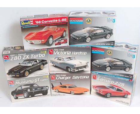 Eight various boxed as issued 1/24 and 1/25 scale Monogram, Revell, and AMT/ERTL plastic Classic Car and Sports car kits, all