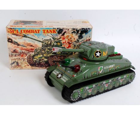 A Taiyo of Japan No. T-91 tinplate and battery operated model of an M4 Combat tank, appears as issued in the original all-car