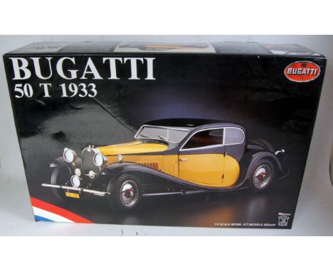 A Pocher 1/8 scale plastic, diecast, white metal and leather model car kit for a 1/8 scale Bugatti 50 T 1933 saloon, appears 