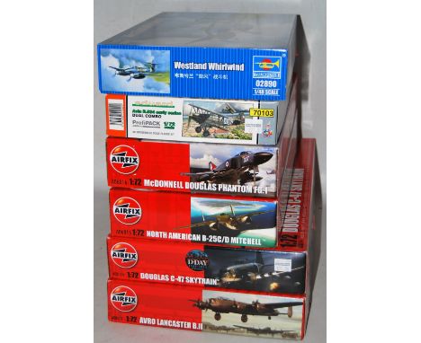 Two boxes containing 17 various mixed scale plastic military kits, mixed manufacturers to include Trumpeter, Wingnut Wings, M