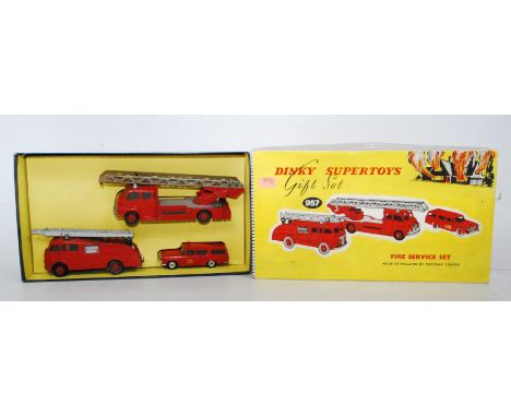 A Dinky Toys No. 957 Fire Service gift set, comprising of three fire service vehicles to include turntable fire escape, No. 9