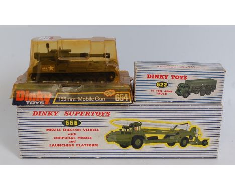 Three various boxed and bubble packed repainted or incomplete military Dinky Toy diecasts, to include No. 666 Missile Erector