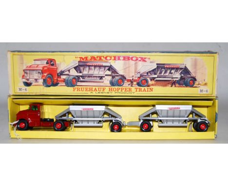 A Matchbox Major Pack series No. 4 Fruehauf hopper train, comprising of dark red cab and chassis with two Fruehauf silver tra