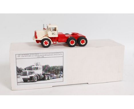 An ATM of France 1/50 scale resin and white metal factory built model of a Cline-Isco 240C tractor unit, with 100 ton flat be