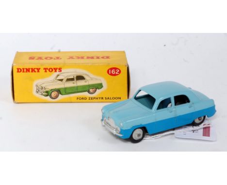 A Dinky Toys No. 162 Ford Zephyr saloon comprising of two-tone blue body with grey hubs, housed in the original correct colou