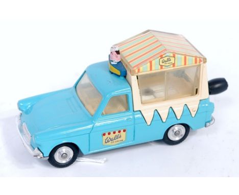 A Corgi Toys No. 428 Smiths Ice Cream van, comprising light blue and cream body with spun hubs and working musical operation,