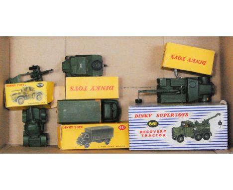 Five various boxed Dinky Toy military diecasts, some boxes with minor damage, examples to include No. 661 recovery tractor, N