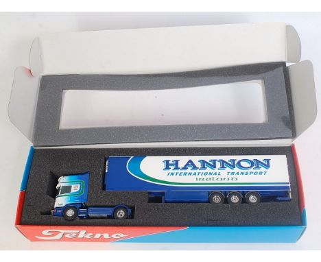 A Tekno 1/50 scale model of a Hannon International Transport Scania 164 tractor unit with refrigerated trailer, appears as is