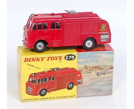 A Dinky Toys No. 276 Airport Fire Tender with flashing light comprising of red body with spun hubs, in the original lift-off 