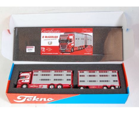 A Tekno Model No. 65844 1/50 scale model of a D McGeough of Ireland, Scania 620 rigid livestock tractor unit with matching tr