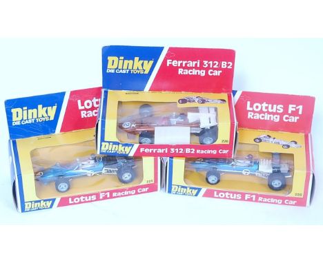 A Dinky Toys boxed racing car diecast group to include 2x No. 225 Lotus F1 racing car, both finished in metallic blue with ra