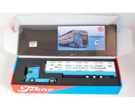 A Tekno 1/50 scale boxed model of a Creggan Transport of Ireland Scania V8 730 tractor unit with livestock trailer, housed in