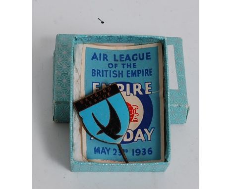 An early 20th century Skybird League pin badge together with an Air League of the British Empire Air Day May 23rd 1936 leafle
