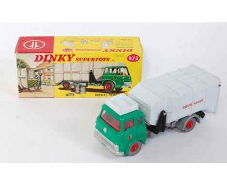 A Dinky Toys No. 978 Refuse Wagon comprising of green cab with silver chassis and light grey back, fitted with red plastic hu