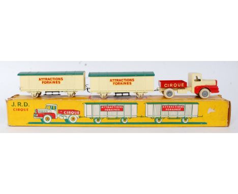 A JRD No. 124 tractor Unic circus tractor unit with two trailers comprising red and cream tractor unit with Cirque livery tog
