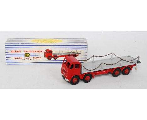 A Dinky Toys No. 905 Foden flat truck with chains comprising of second type red cab with matching chassis and red Supertoys h