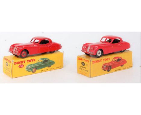 A Dinky Toys No. 157 boxed Jaguar XK120 coupe diecast group to include a light red example with spun hubs, together with a da