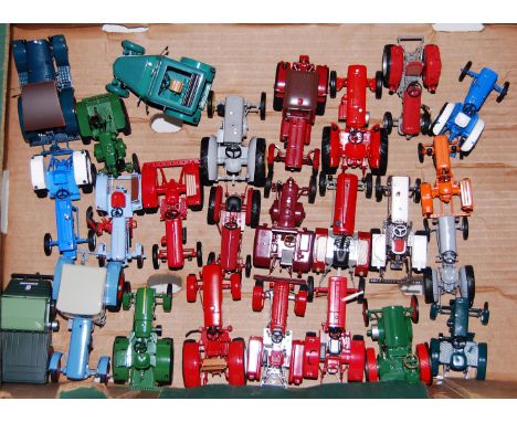 One tray containing a quantity of Atlas edition plastic and diecast model tractors to include a McCormack International 624 t