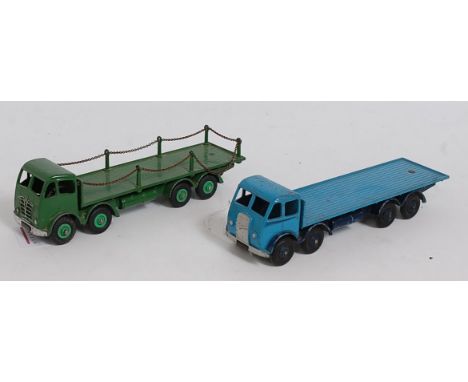 A Dinky Toys loose playworn Foden diecast group, two examples to include a First Type cab, Foden flat bed truck comprising li