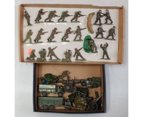 Two trays containing a mixed loose military diecast and plastic figures to include Dinky Toys, Britains and others, examples 