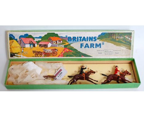 A Britains set No. 1447 Hunting Series Full Cry boxed set, comprising of 11 various hunting pieces to include hounds, fox, an