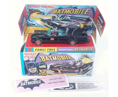 A Corgi Toys No. 267 Batmobile, comprising gloss black body with gold and red Bat logo hubs, with Bat logo stickers to doors,