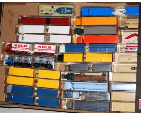 30 various plastic cased Wiking H0 scale commercial vehicles and gift sets to include a Kolb Transport tractor unit and drawb