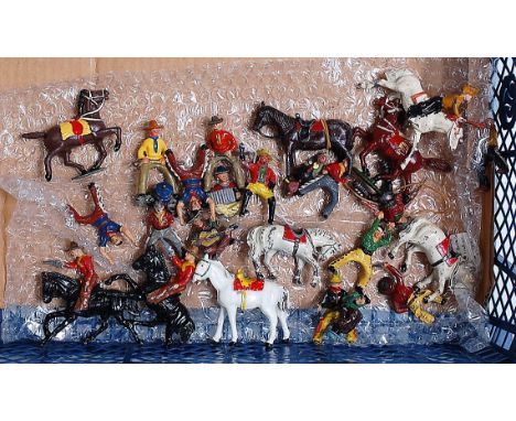 A collection of various John Hilco and Timpo cowboys and Indians figures to include various musicians, standing figures with 