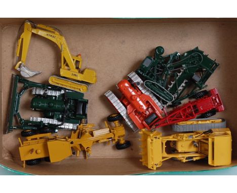One tray containing a quantity of various white metal kit built construction models, 7 examples in total, to include a Fowler