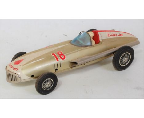 A Bandai of Japan tinplate and friction drive model of a Golden Jet racing car comprising of gold, cream and red body with Go