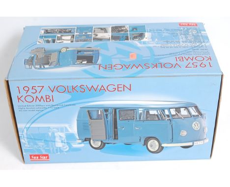 A Sunstar limited edition 1/12 scale model of a 1957 Volkswagen Combi van finished in RAF blue with black interior, appears a