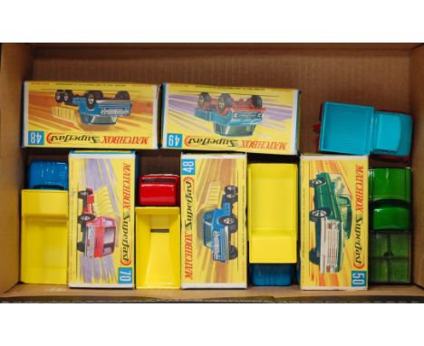 Five various boxed Matchbox Superfast diecasts to include 2x No. 48 Dodge Dumper truck, No. 49 Unimog, No. 50 Kennel truck, a