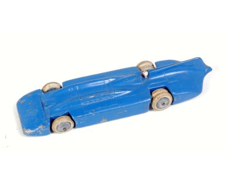 A Britains No. 1400 Blue Bird Speed Record Car comprising of two piece casting with blue body and white driver with silver en