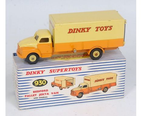 A Dinky Toys No. 930 Bedford Pallet Jekta van, comprising orange and lemon yellow body with yellow cast hubs and Dinky Toys l