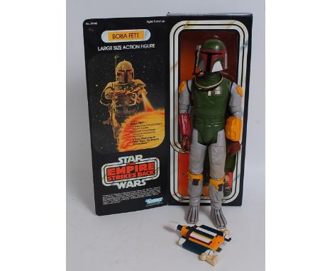 A Star Wars Empire Strikes Back Kenner Toys, large size action figure of Boba Fett, appears complete with various accessories