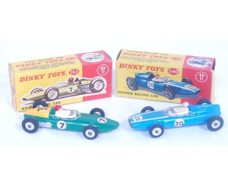 A Dinky Toys boxed racing car diecast group to include No. 240 Cooper racing car comprising two-tone blue body with racing No