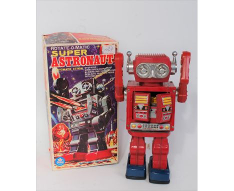 A Sunny Toys of Taiwan tinplate and battery operated model of a Rotate-o-matic Super Astronaut Robot, with stop and go workin