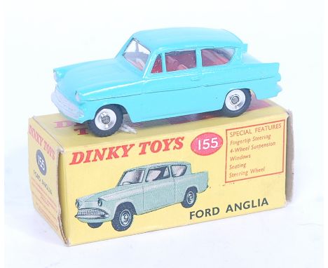 A Dinky Toys No. 155 Ford Anglia comprising turquoise body with red interior, and spun hubs, in the original all-card box (NM