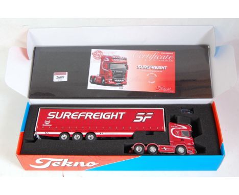 A Tekno 1/50 scale model No. 68034 Surefreight of Ireland model of a Scania R560, tractor unit with curtain side trailer, lim